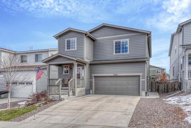 front of property with a garage