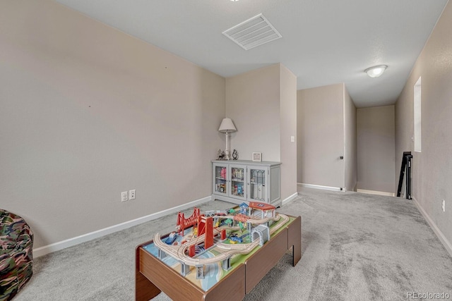 recreation room featuring carpet flooring