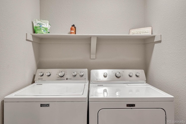 washroom featuring separate washer and dryer