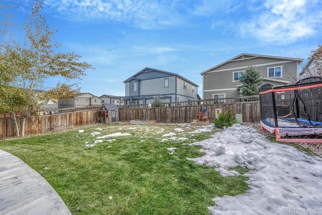 view of yard with a trampoline