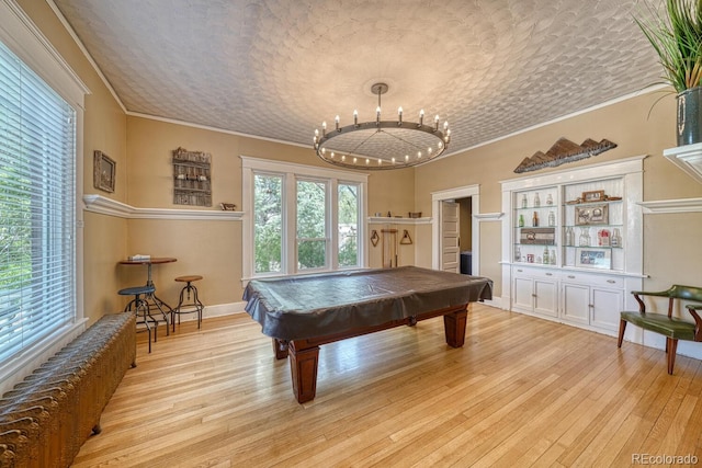 403 Scott St, Salida, CO 81201 - game room featuring light wood-type flooring, crown molding, billiards, radiator, and a chandelier