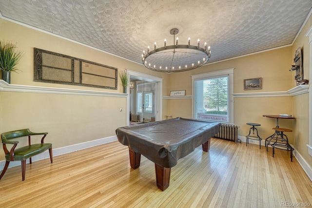 403 Scott St, Salida, CO 81201 - playroom with hardwood / wood-style floors, ornamental molding, radiator, billiards table, and baseboards