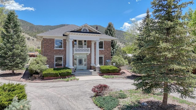 403 Scott St, Salida, CO 81201 - neoclassical home with brick siding and a mountain view
