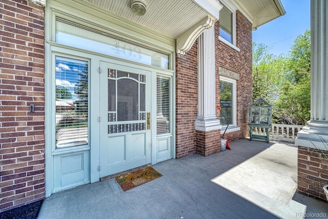 403 Scott St, Salida, CO 81201 - view of exterior entry with brick siding and covered porch