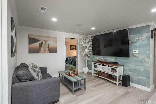 living room with crown molding and light wood-type flooring