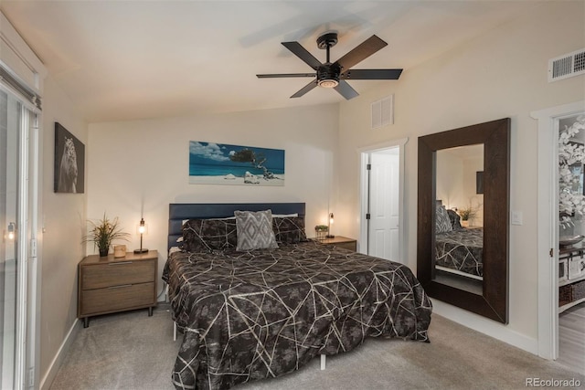 carpeted bedroom featuring ceiling fan and vaulted ceiling