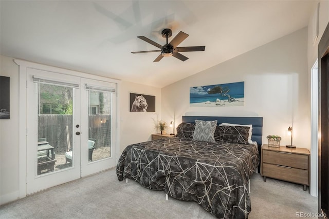 bedroom featuring vaulted ceiling, light carpet, french doors, access to exterior, and ceiling fan