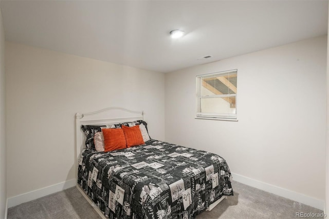 bedroom featuring carpet