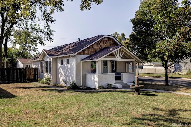 view of front of property with a front lawn