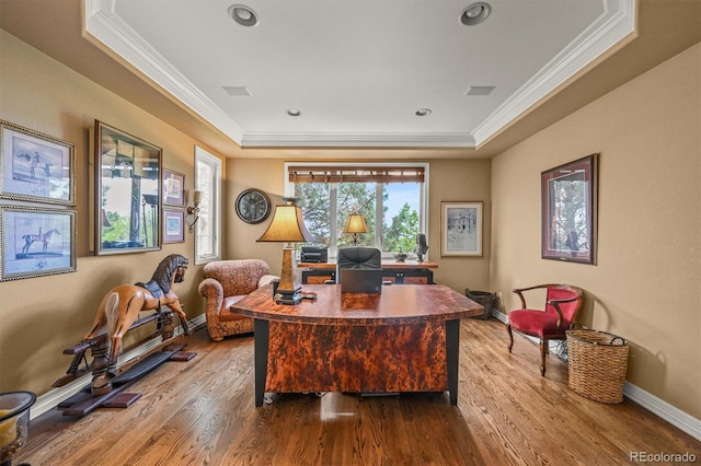 8518 High Rdg, Castle Pines, CO 80108 - home office with a tray ceiling, ornamental molding, baseboards, wood finished floors, and recessed lighting