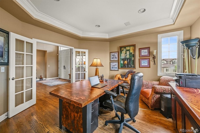 8518 High Rdg, Castle Pines, CO 80108 - office with french doors, ornamental molding, a raised ceiling, and wood finished floors