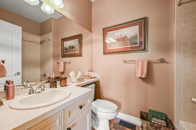 8518 High Rdg, Castle Pines, CO 80108 - bathroom with a tile shower, toilet, and vanity