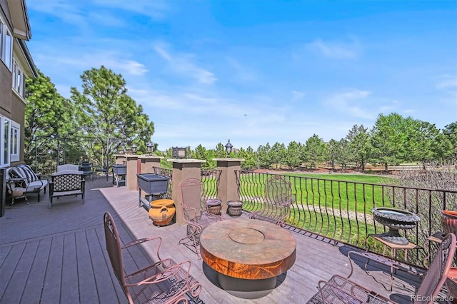 8518 High Rdg, Castle Pines, CO 80108 - deck featuring a lawn