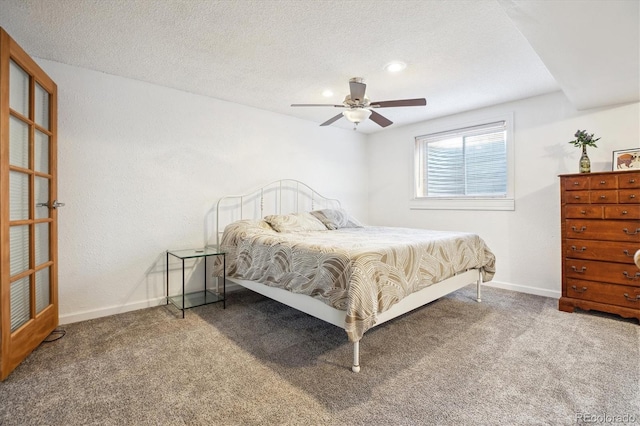 5007 S Richfield Cir, Aurora, CO 80015 - carpeted bedroom with baseboards, a textured ceiling, and a ceiling fan