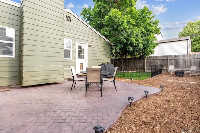 5007 S Richfield Cir, Aurora, CO 80015 - view of patio / terrace featuring an outdoor fire pit and outdoor dining space