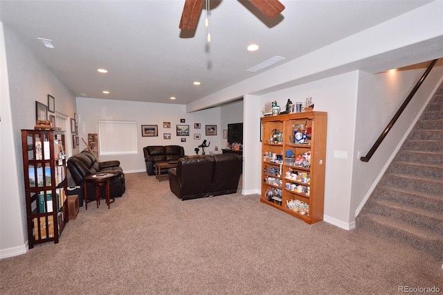 10511 Desert Bloom Way, Colorado Springs, CO 80925 - carpeted living room with stairs, a ceiling fan, and recessed lighting