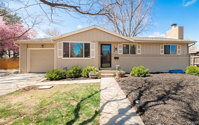 2756 E Euclid Ave, Centennial, CO 80121 - ranch-style home with a chimney, brick siding, concrete driveway, and a garage