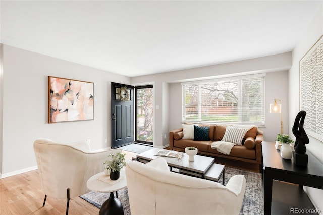 2756 E Euclid Ave, Centennial, CO 80121 - living room with light wood-style floors, plenty of natural light, and baseboards