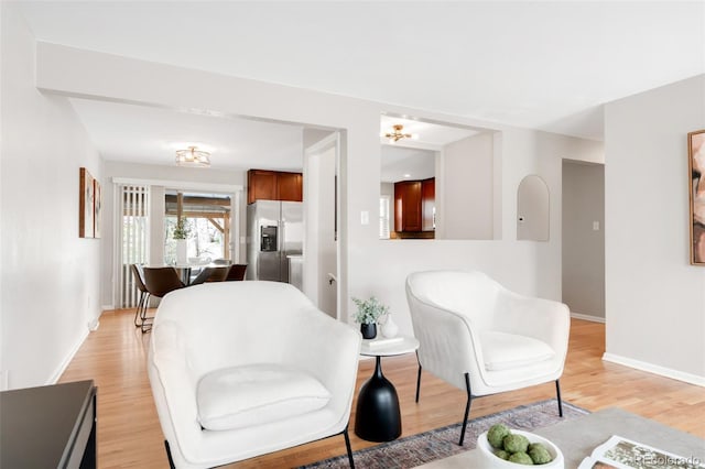2756 E Euclid Ave, Centennial, CO 80121 - living area featuring light wood-type flooring and baseboards