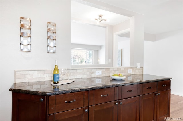 2756 E Euclid Ave, Centennial, CO 80121 - bar featuring backsplash and light wood-type flooring