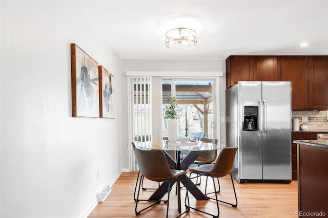 2756 E Euclid Ave, Centennial, CO 80121 - dining room with light wood finished floors, baseboards, and recessed lighting
