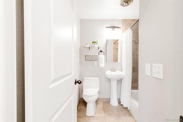 2756 E Euclid Ave, Centennial, CO 80121 - full bathroom with toilet, tile patterned floors, a sink, and shower / bathtub combination with curtain