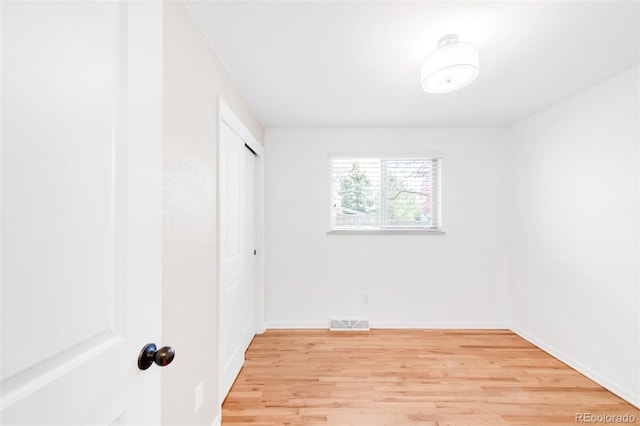 2756 E Euclid Ave, Centennial, CO 80121 - unfurnished bedroom featuring light wood-style floors, baseboards, and a closet