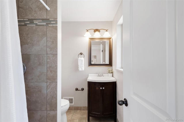 2756 E Euclid Ave, Centennial, CO 80121 - full bathroom with toilet, tiled shower, and vanity