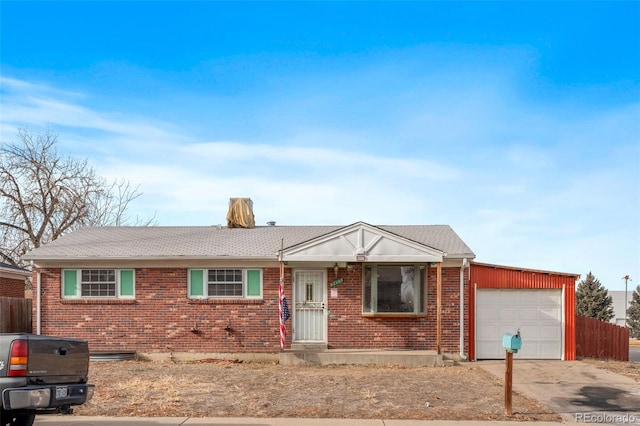 ranch-style home with a garage