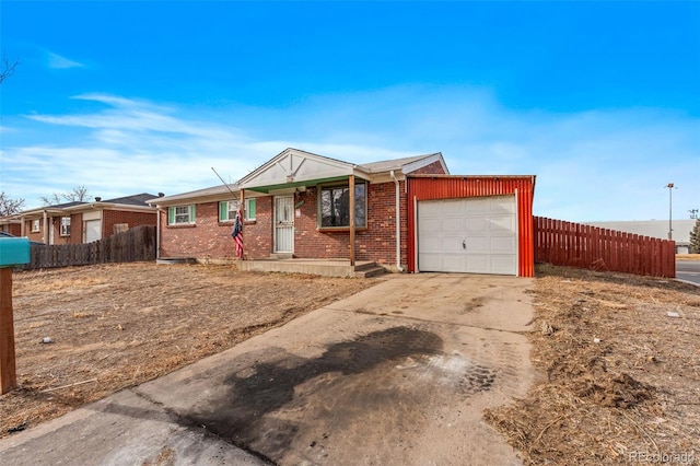 ranch-style home with a garage