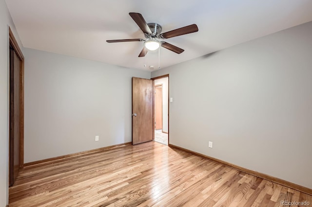 1824 S Columbine St, Denver, CO 80210 - unfurnished bedroom with light wood finished floors, a closet, baseboards, and ceiling fan