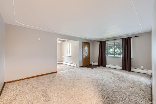 1824 S Columbine St, Denver, CO 80210 - unfurnished room featuring a baseboard heating unit, carpet floors, and baseboards