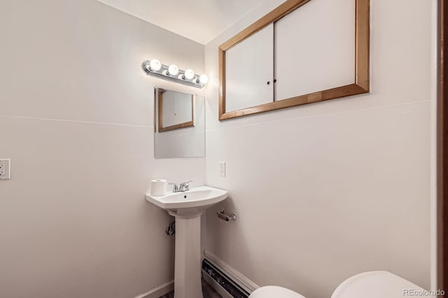 1824 S Columbine St, Denver, CO 80210 - bathroom featuring toilet and a baseboard radiator