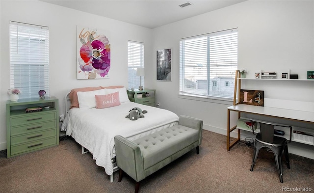 bedroom featuring carpet, multiple windows, and visible vents