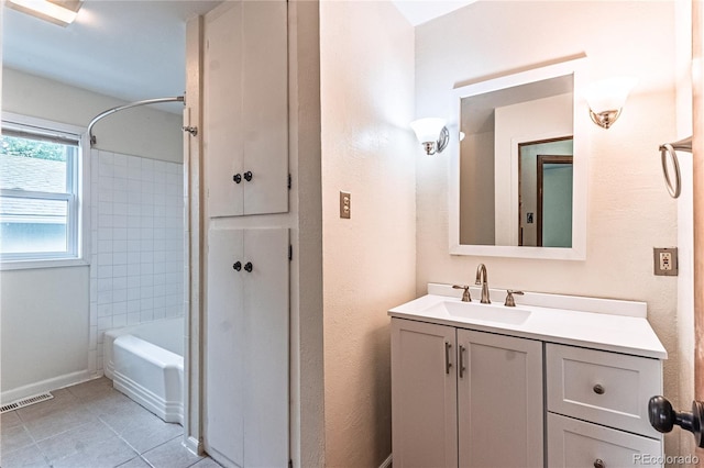 1325 N Foote Ave, Colorado Springs, CO 80909 - full bathroom with vanity, shower / washtub combination, tile patterned flooring, and baseboards
