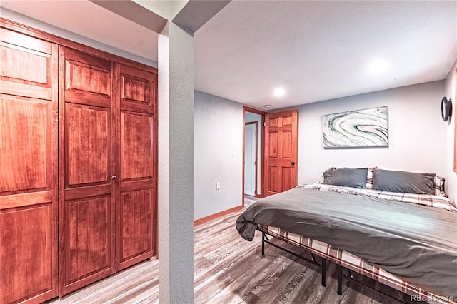 1325 N Foote Ave, Colorado Springs, CO 80909 - bedroom featuring light wood-style floors, baseboards, and recessed lighting