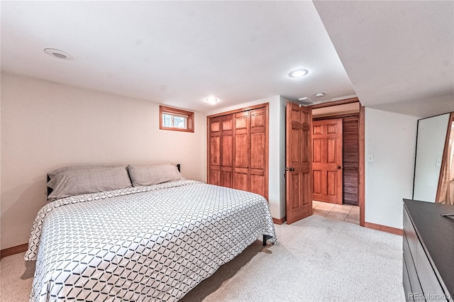 1325 N Foote Ave, Colorado Springs, CO 80909 - bedroom with light carpet, baseboards, a closet, and recessed lighting