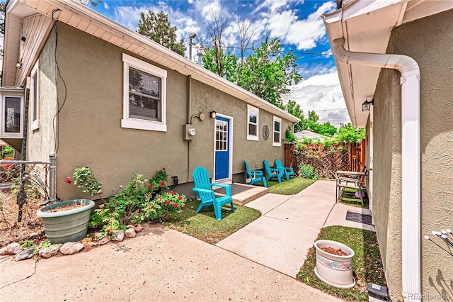 1325 N Foote Ave, Colorado Springs, CO 80909 - property entrance with a patio area and stucco siding