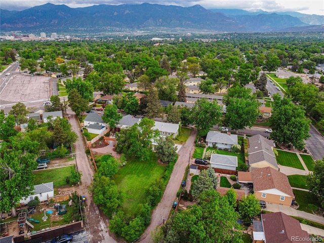 1325 N Foote Ave, Colorado Springs, CO 80909 - aerial view of property and surrounding area with mountains and nearby suburban area
