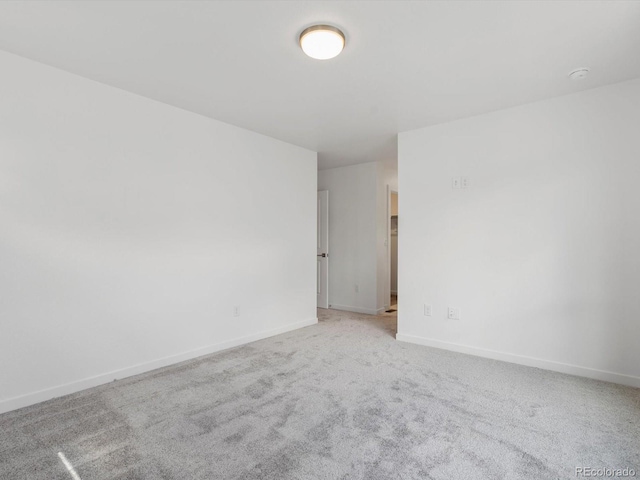 2036 S Holly St Unit 4, Denver, CO 80222 - empty room with light carpet and baseboards