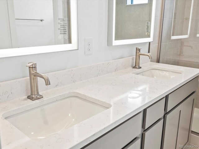 2036 S Holly St Unit 4, Denver, CO 80222 - full bath featuring a sink and double vanity