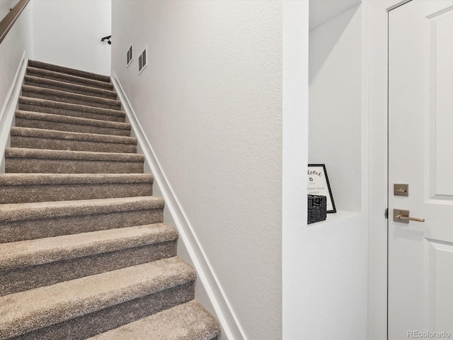 2036 S Holly St Unit 4, Denver, CO 80222 - stairs with visible vents