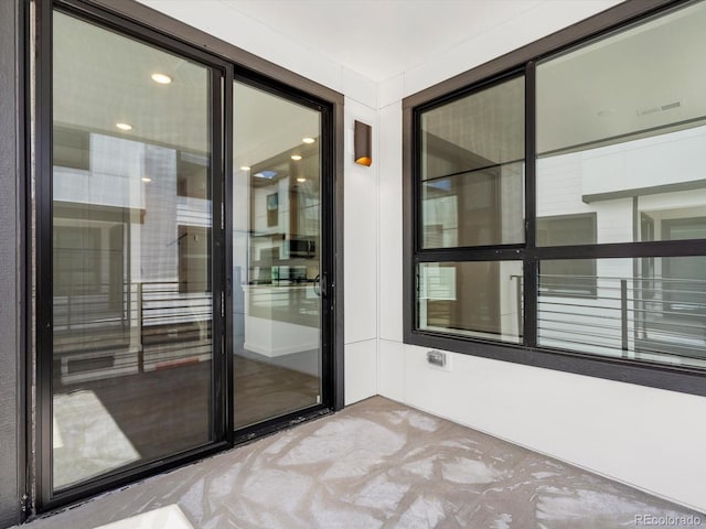 2036 S Holly St Unit 4, Denver, CO 80222 - view of exterior entry with visible vents