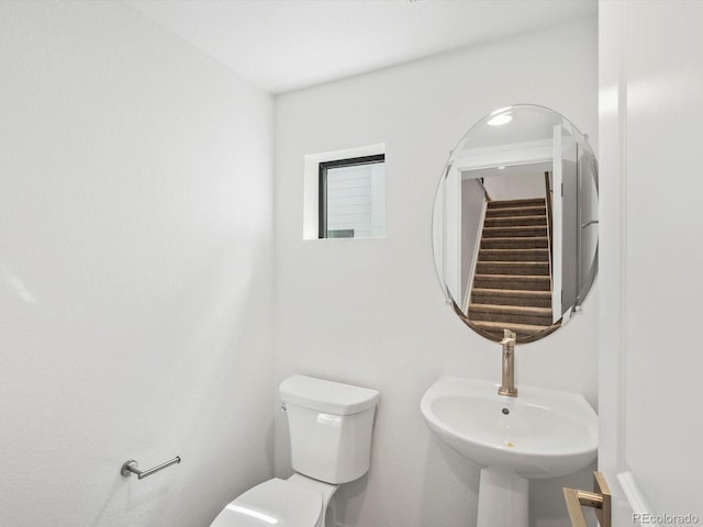 2036 S Holly St Unit 4, Denver, CO 80222 - bathroom with toilet and a sink