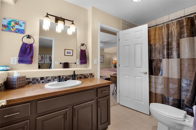 bathroom featuring vanity, decorative backsplash, toilet, tile patterned floors, and a shower with shower curtain