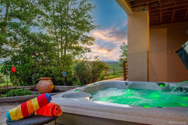 view of pool featuring a hot tub