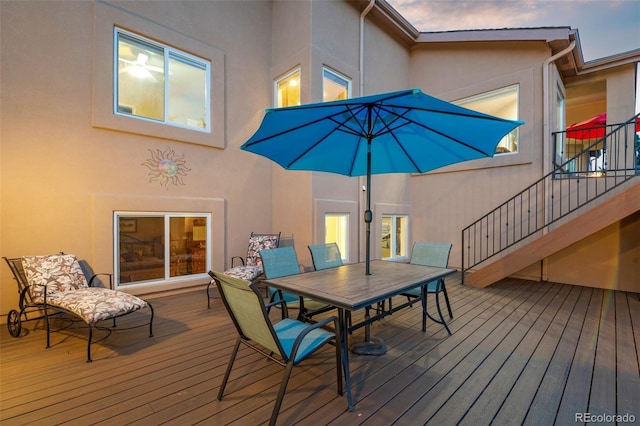 deck with outdoor dining space