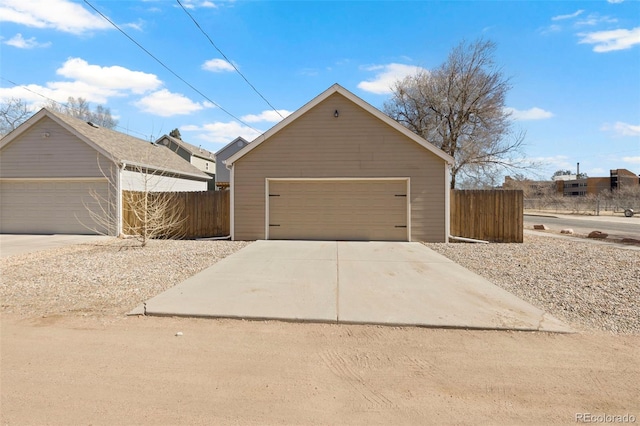 detached garage with fence