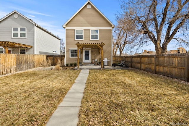 view of front of home with a fenced backyard, a front lawn, and a pergola