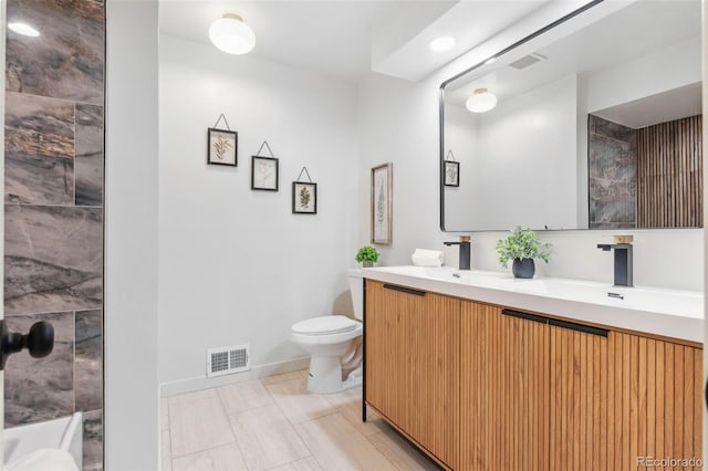 2180 Myrtlewood Ln, Lakewood, CO 80215 - full bath featuring toilet and double vanity